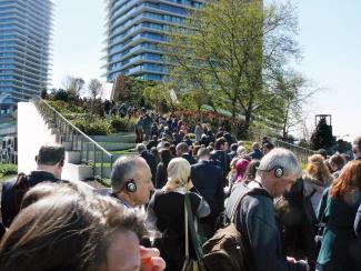 Lots of people climbing the green roofs